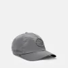 Baseballkeps med dragsko och Compass-brodyr Baseballkeps med dragsko och Compass-brodyr