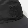 Baseballkeps med dragsko och Compass-brodyr Baseballkeps med dragsko och Compass-brodyr