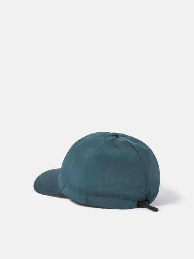 Baseballkeps med dragsko och Compass-brodyr Baseballkeps med dragsko och Compass-brodyr