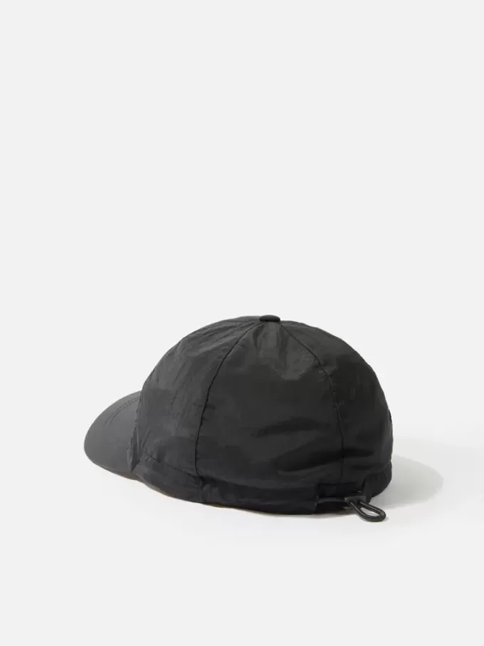Baseballkeps med dragsko och Compass-brodyr Baseballkeps med dragsko och Compass-brodyr
