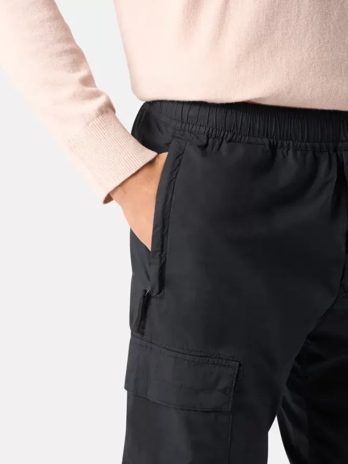 Cargobyxor med normal passform och smalare ben, med fickor med dragkedja