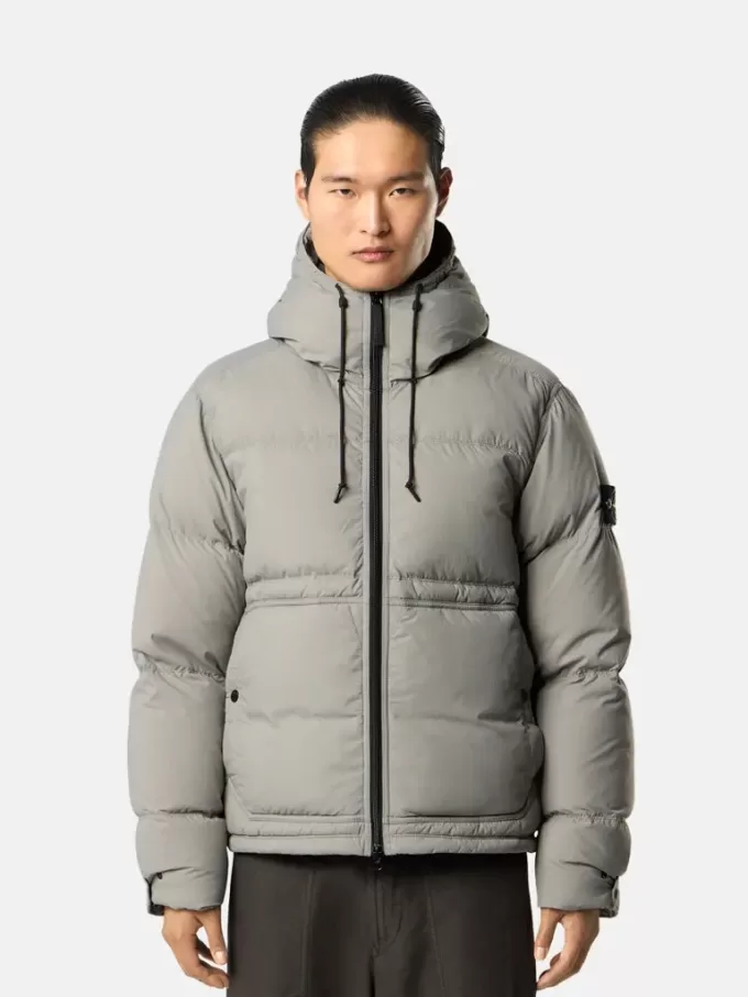 Dunparkas med vattenavvisande egenskaper och tryckknappsfickor Dunparkas med vattenavvisande egenskaper och tryckknappsfickor