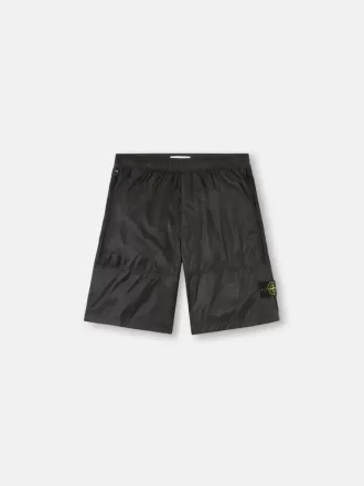 Lösa bermuda-shorts med vid ben och elastisk midja