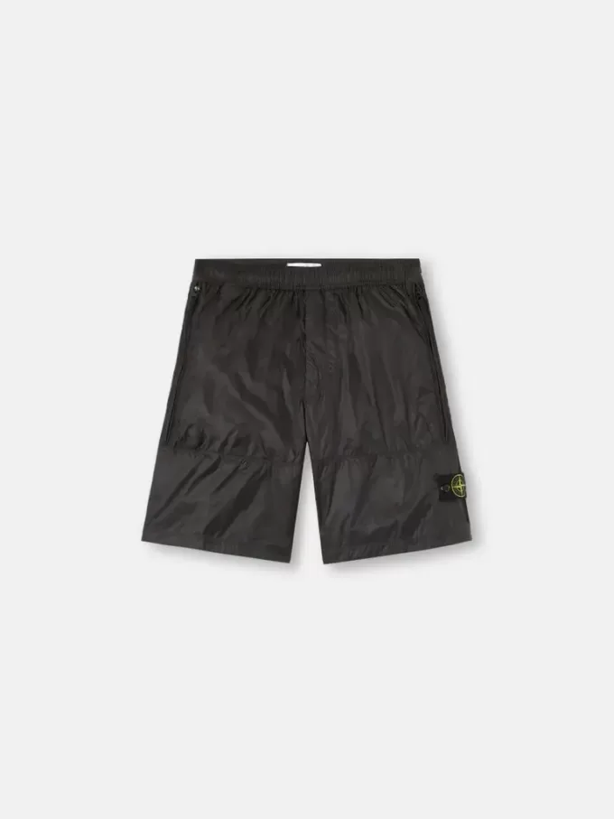 Lösa bermuda-shorts med vid ben och elastisk midja
