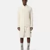 Lösa bermuda-shorts med vid ben och elastisk midja Lösa bermuda-shorts med vid ben och elastisk midja