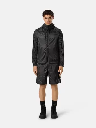 Lösa bermuda-shorts med vid ben och elastisk midja