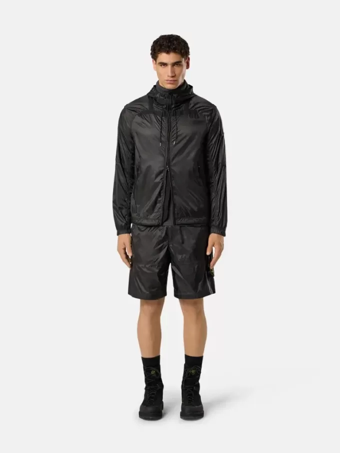 Lösa bermuda-shorts med vid ben och elastisk midja