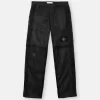 Löst sittande joggingbyxor med fickor med dragkedja och justerbara benslut