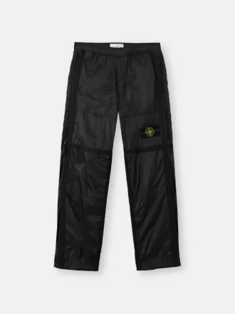 Löst sittande joggingbyxor med fickor med dragkedja och justerbara benslut
