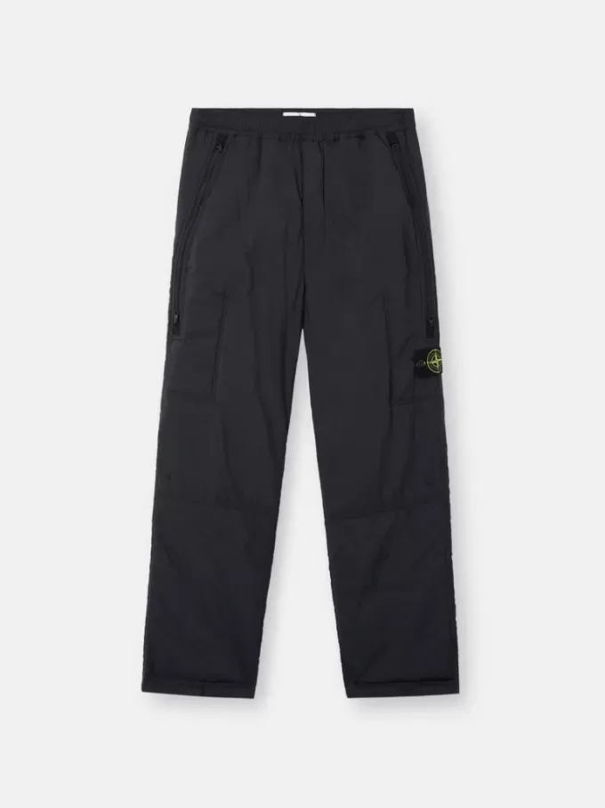 Löst sittande sweatpants med fickor med dragkedja och vaddering Löst sittande sweatpants med fickor med dragkedja och vaddering