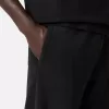 Löst sittande sweatpants med fickor och elastiska muddar