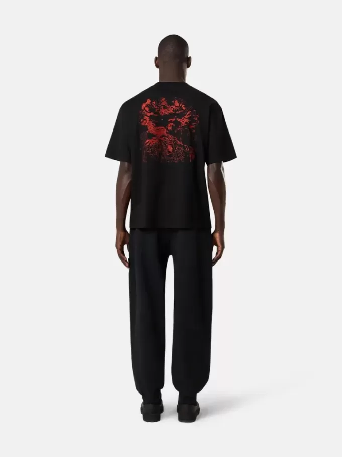 Löst sittande sweatpants med fickor och elastiska muddar
