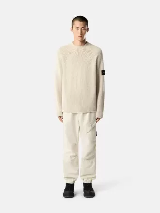 Löst sittande sweatpants med tryckknappar och fickor med dragkedja