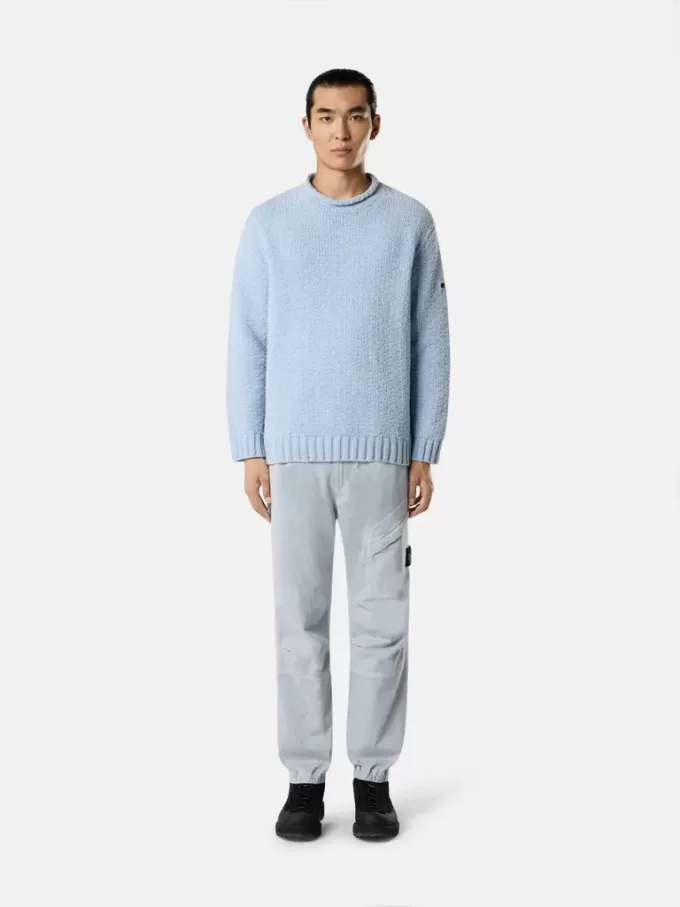 Löst sittande sweatpants med tryckknappar och fickor med dragkedja