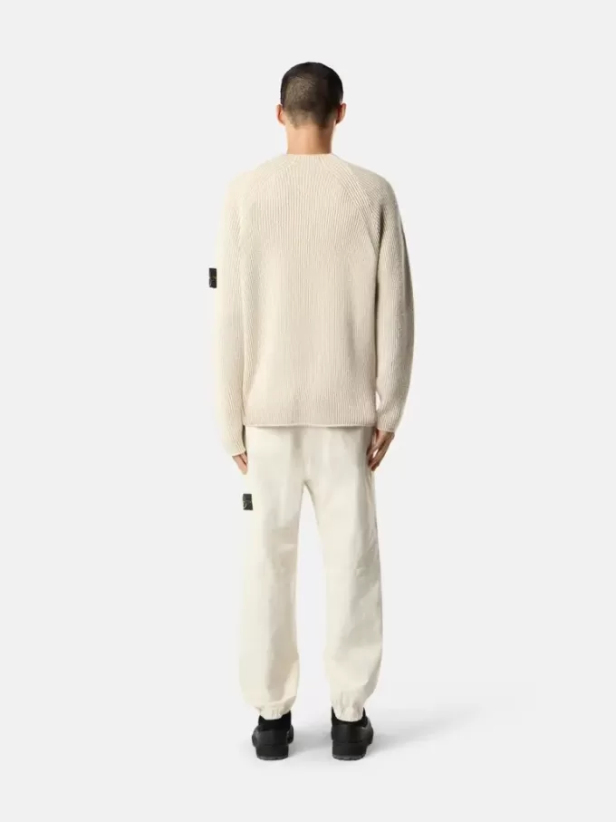 Löst sittande sweatpants med tryckknappar och fickor med dragkedja