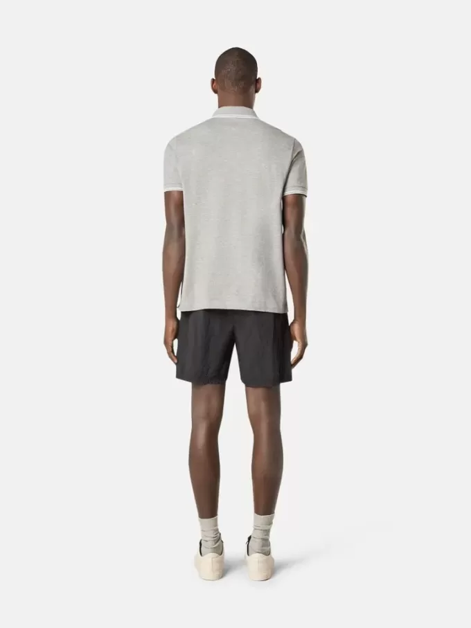 Slim fit kortärmad polotröja med randiga detaljer