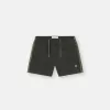 Smal passformade badshorts med fickor och meshfoder Smal passformade badshorts med fickor och meshfoder