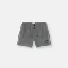 Smal passformade badshorts med fickor och meshfoder Smal passformade badshorts med fickor och meshfoder