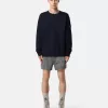 Smal passformade badshorts med fickor och meshfoder Smal passformade badshorts med fickor och meshfoder