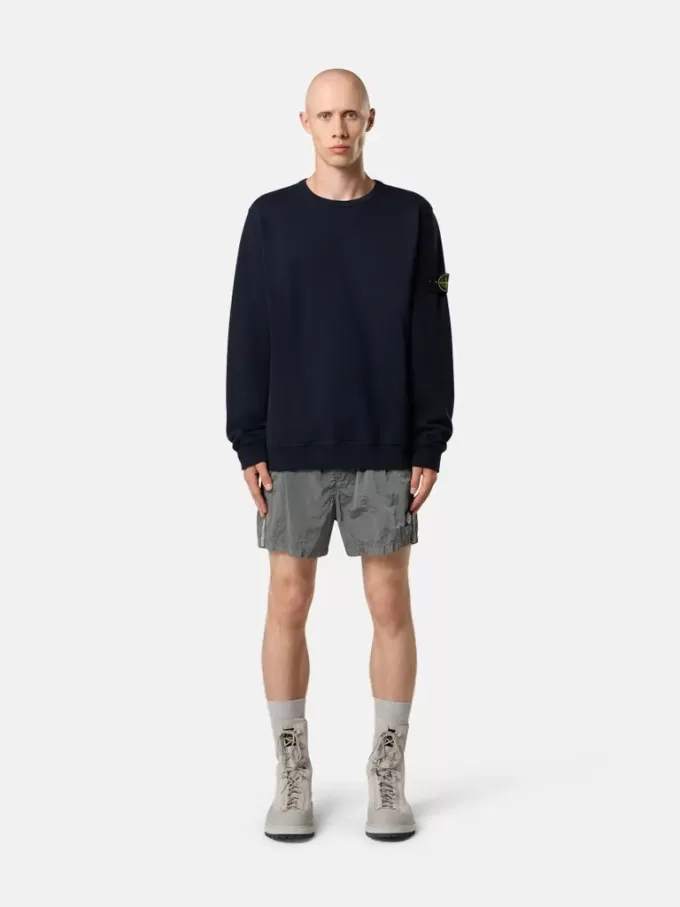 Smal passformade badshorts med fickor och meshfoder Smal passformade badshorts med fickor och meshfoder