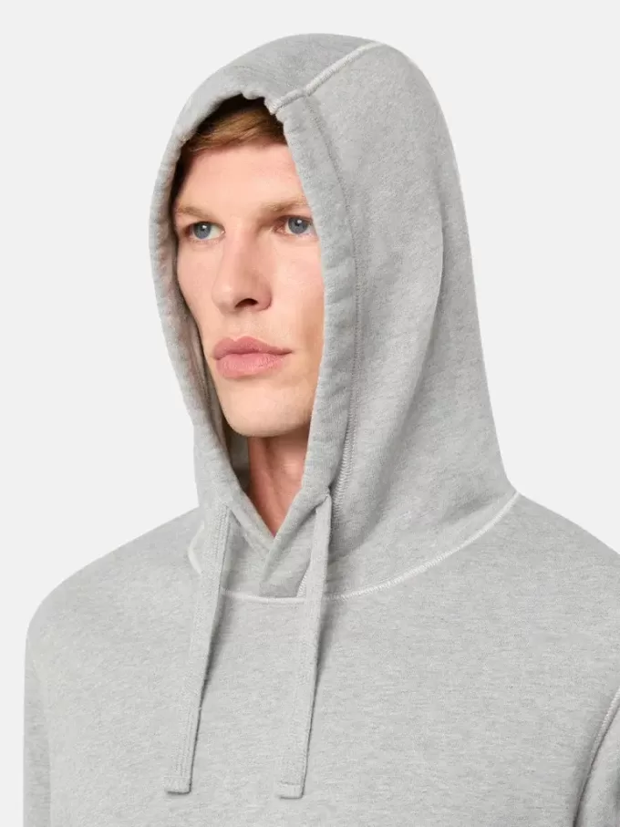 Sweatshirt med dragsko i huvan och fickor