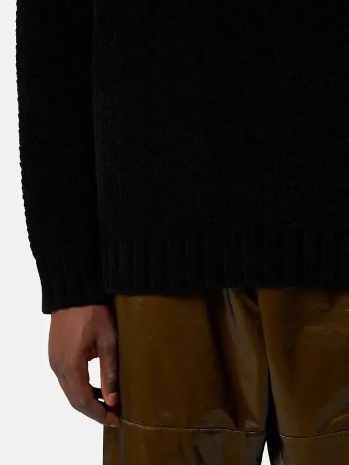 Tröja med hög krage och detaljer i omvänd söm