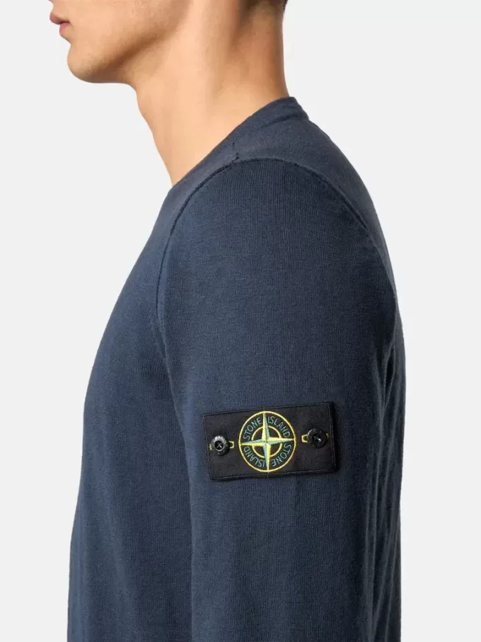Tröja med rund hals och små rullade detaljer